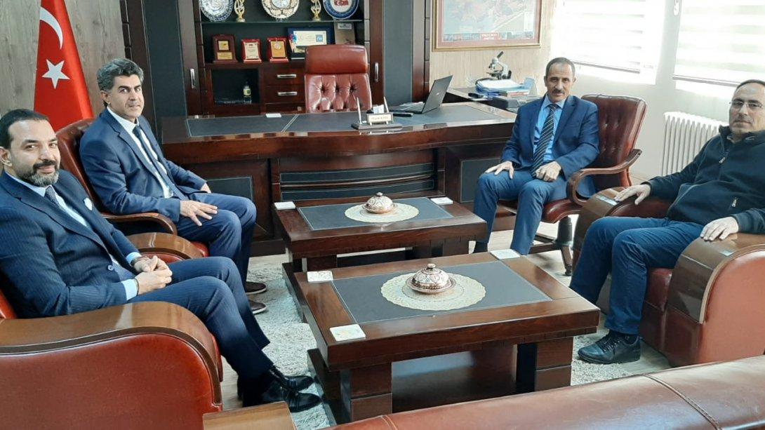 Elazığ Fırat Üniversitesi Rektörü Prof. Dr. Kutbeddin DEMİRDAĞ, İlçe Milli Eğitim Müdürümüz Murat KAYA'yı ziyaret ettiler.
